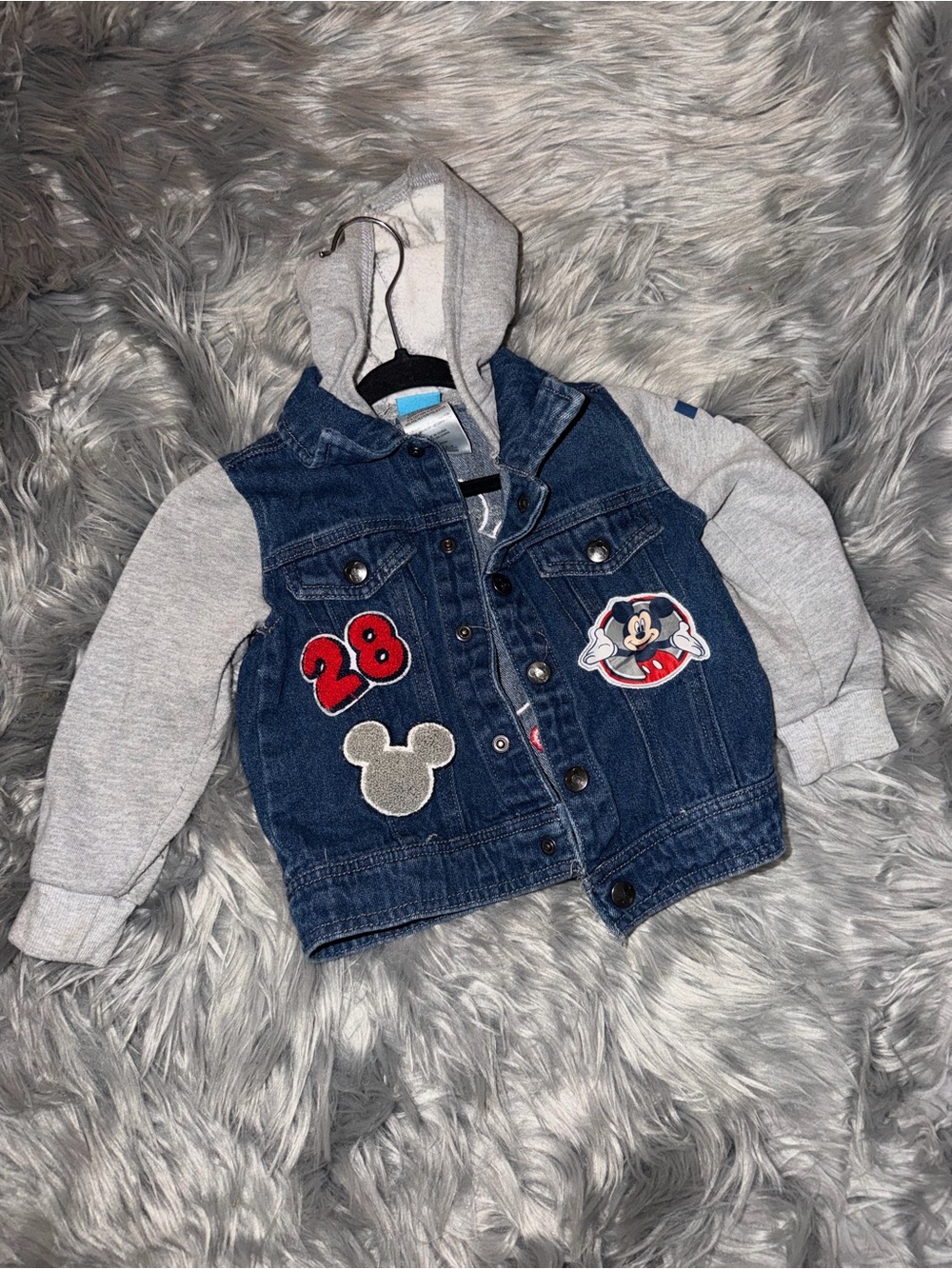 Disney Blue Denim Jacket with Gray Hoodie and Red Patch Accents